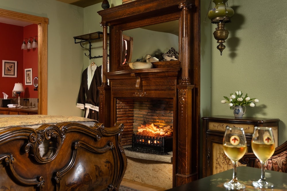 Guest room with fireplace at the most romantic getaways in Wisconsin near Cedarburg