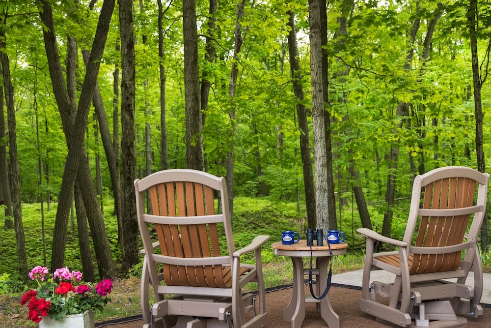 Ride the Muskegon Ferry to Our Bed and Breakfast 9 Chairs in the woods - forest bathing at our top-rated Bed and Breakfastin Wisconsin